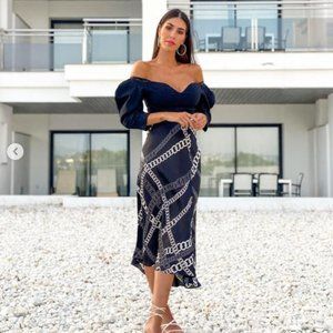 CHAIN PRINT SKIRT FLOWY MIDI SKIRT. ASYMMETRIC HEM